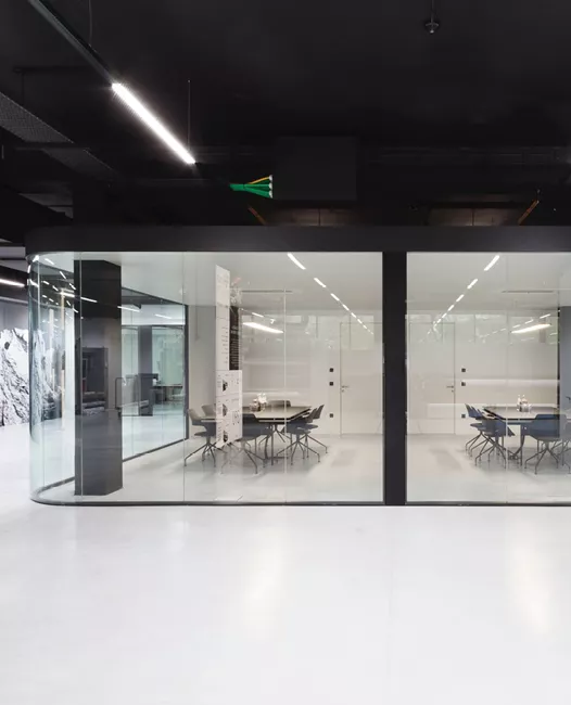 inside view of a modern meeting room with a glass front