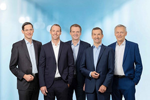 company co-founder Georg Kopetz with Executive Board members Dirk Linzmeier, Harald Triplat, Stefan Poledna and Friedhelm Pickhard. Image © Helmut Mitter