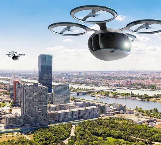 Artist's impression of air taxis flying over a city